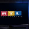 POZNAN, POL - FEB 04, 2020: Flat-screen TV set displaying logo of RTL, a German free-to-air television channel owned by the RTL Group