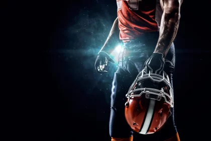 Im Bild ein Football Spieler. Football und NFL-Deko