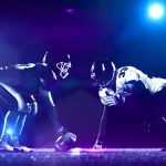american football players are ready to start on field at night