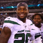 EAST RUTHERFORD, NJ - OCTOBER 13: New York Jets running back Le Veon Bell 26 smiles after the National Football League game between the New York Jets and the Dallas Cowboys on October 13, 2019 at MetLife Stadium in East Rutherford, NJ. Photo by Rich Graessle/Icon Sportswire NFL, American Football Herren, USA OCT 13 Cowboys at Jets PUBLICATIONxINxGERxSUIxAUTxHUNxRUSxSWExNORxDENxONLY Icon1910131158