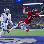 NFL, American Football Herren, USA Tampa Bay Buccaneers at Dallas Cowboys, Sep 11, 2022 Arlington, Texas, USA Tampa Bay Buccaneers wide receiver Mike Evans 13 makes a leaping touchdown catch over Dallas Cowboys cornerback Trevon Diggs 7 during the third quarter at AT&ampT Stadium. Mandatory Credit: Kevin Jairaj-USA TODAY Sports, 11.09.2022 21:21:45, 19032449, NPStrans, Mike Evans, Tampa Bay Buccaneers, NFL, Trevon Diggs, wow, AT&ampT Stadium, TopPic, Dallas Cowboys PUBLICATIONxINxGERxSUIxAUTxONLY Copyright: xKevinxJairajx 19032449