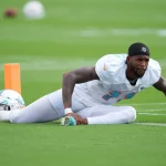 NFL, American Football Herren, USA Miami Dolphins Training Camp, Aug 3, 2022 Miami Gardens, Florida, US Miami Dolphins wide receiver Cedrick Wilson Jr. 11 stretches during training camp at Baptist Health Training Complex. Mandatory Credit: Jasen Vinlove-USA TODAY Sports, 03.08.2022 10:43:32, 18812419, Miami Dolphins, NPStrans, NFL PUBLICATIONxINxGERxSUIxAUTxONLY Copyright: xJasenxVinlovex 18812419