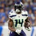 Seattle Seahawks vs Detroit Lions Seattle Seahawks wide receiver DK Metcalf 14 carries the ball during an NFL, American Football Herren, USA football game between the Detroit Lions and the Seattle Seahawks in Detroit, Michigan USA, on Sunday, October 2, 2022. Detroit Michigan United States PUBLICATIONxNOTxINxFRA Copyright: xAmyxLemusx originalFilename:lemus-seattles221002_npZfA.jpg