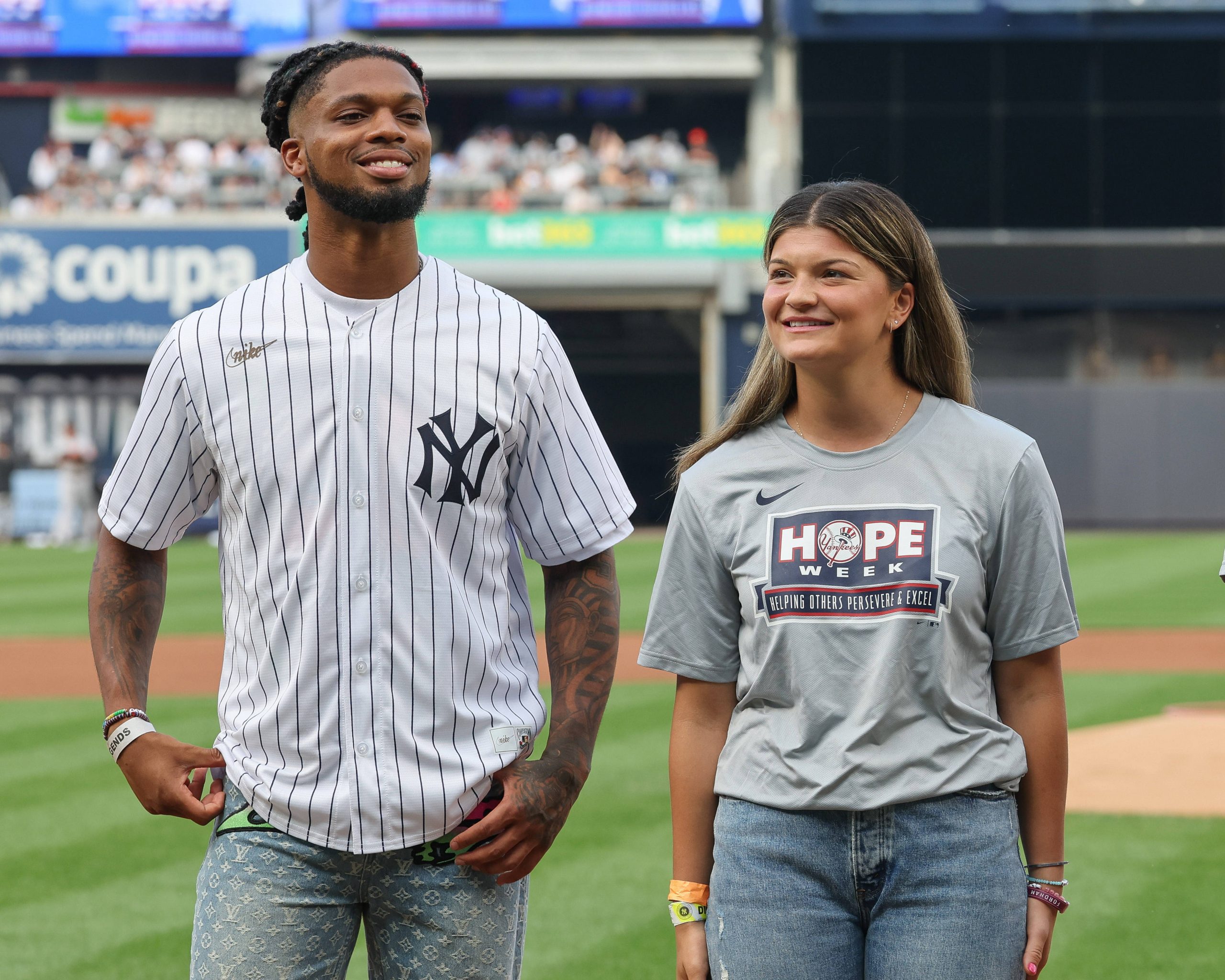 MLB, Baseball Herren, USA Baltimore Orioles at New York Yankees Jul 3, 2023 Bronx, New York, USA Buffalo Bills safety Damar Hamlin and Fordham softball player Sarah Taffet are honored by the New York Yankees as part of HOPE Week before the game between the New York Yankees and the Baltimore Orioles at Yankee Stadium. Bronx Yankee Stadium New York USA, EDITORIAL USE ONLY PUBLICATIONxINxGERxSUIxAUTxONLY Copyright: xVincentxCarchiettax 20230703_gav_cb6_067