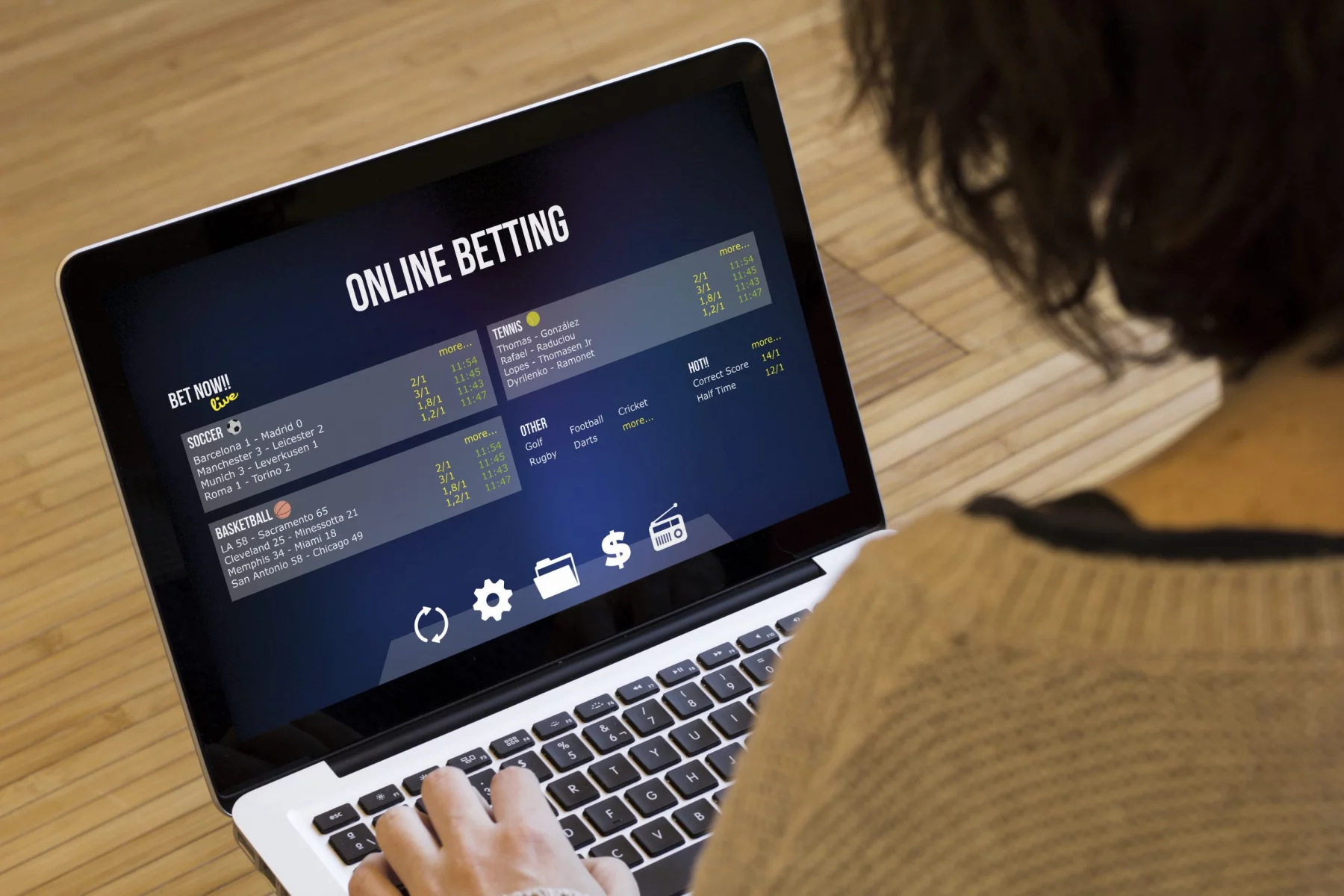 betting at home: close up view of woman using the computer to bet