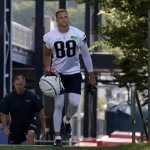 FOXBOROUGH, MA - JULY 26: New England Patriots tight end Mike Gesicki 88 walks to practice during the opening day of New England Patriots Training Camp on July 26, 2023, at the Patriots Practice Facility at Gillette Stadium in Foxborough, Massachusetts. Photo by Fred Kfoury III/Icon Sportswire NFL, American Football Herren, USA JUL 26 New England Patriots Training Camp EDITORIAL USE ONLY Icon482230726131