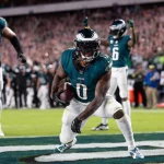 FootballR - NFL - Die Eagles laufen mit dem Ball.