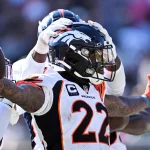 FootballR - NFL - Die Denver Broncos jubeln nach einem Touchdown in der NFL. Safety Kareem Jackson