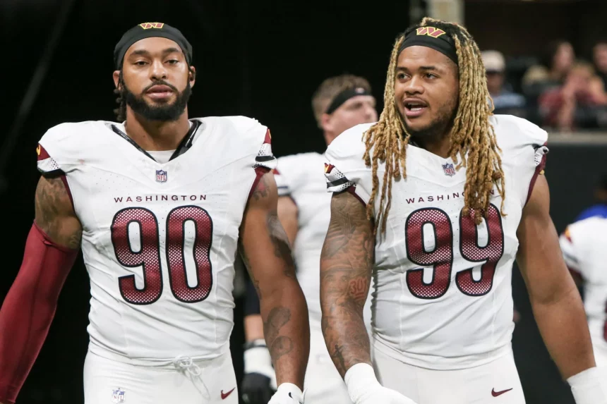 October 15, 2023, Atlanta, Georgia, United States: Washington Commanders defensive ends Montez Sweat 90 and Chase Young 99 enter the field after halftime against the Atlanta Falcons at Mercedes-Benz Stadium. Atlanta United States - ZUMAw109 20231015_fap_w109_017 Copyright: xDebbyxWongx