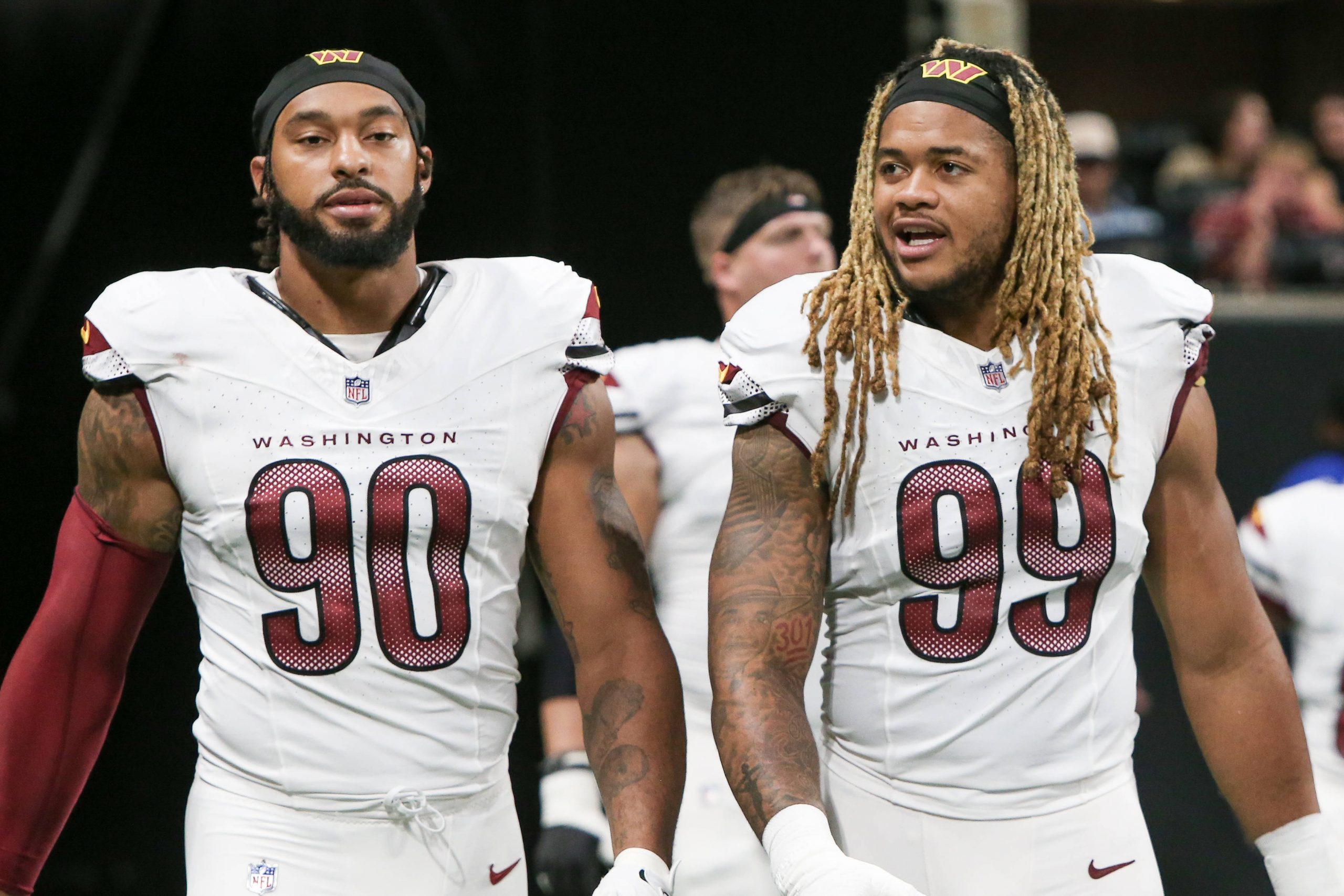 October 15, 2023, Atlanta, Georgia, United States: Washington Commanders defensive ends Montez Sweat 90 and Chase Young 99 enter the field after halftime against the Atlanta Falcons at Mercedes-Benz Stadium. Atlanta United States - ZUMAw109 20231015_fap_w109_017 Copyright: xDebbyxWongx
