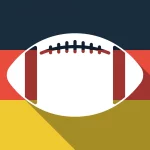 FootballR - NFL - Ein Football mit langem Schatten auf der Flagge Deutschlands bei den Frankfurt Games.