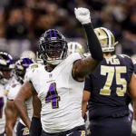 FootballR - NFL - Die Baltimore Ravens, ein NFL-Team, feiern ausgelassen während eines Spiels. (Im Bild Jason Pierre-Paul)