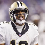 FootballR - NFL - Der NFL-Star Michael Thomas, ein Footballspieler der New Orleans Saints, hat den Mund offen.