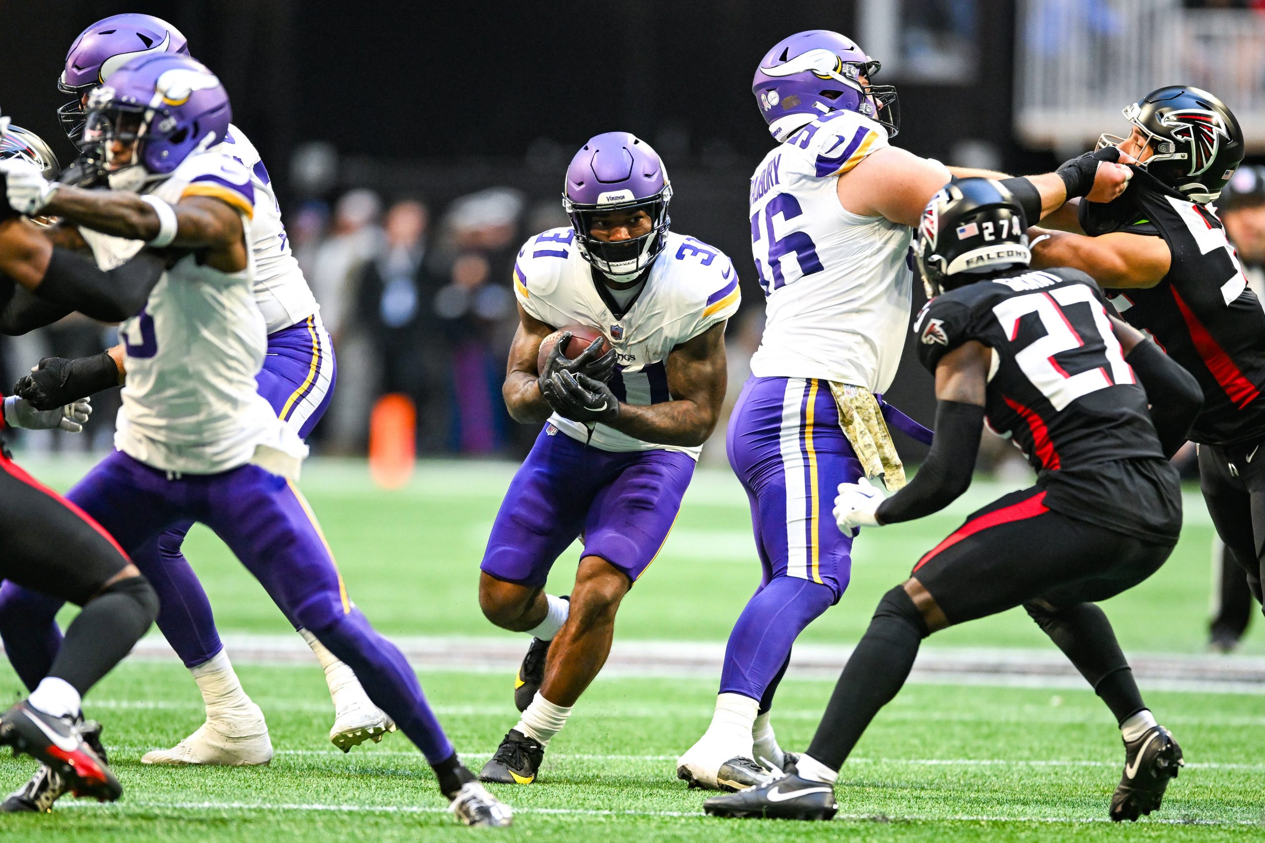 Minnesota Vikings Running Back Cam Akers läuft mit dem Ball