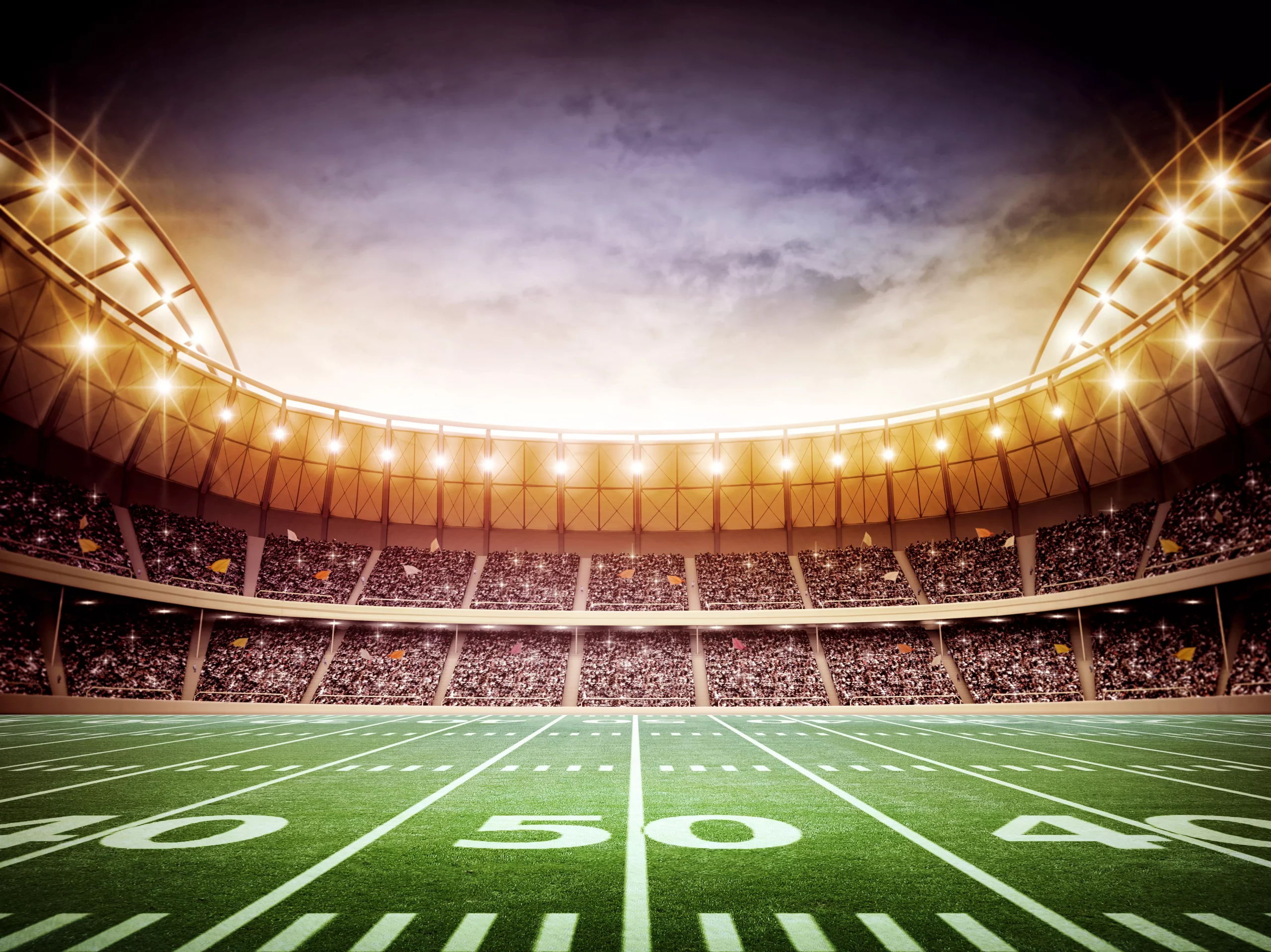 FootballR - NFL Spielplan - Championship Games - DAZN NFL Programm - Ein American-Football-Stadion bei Nacht, in dem ein NFL-Spiel stattfindet.
