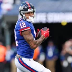 FootballR - NFL - Ein Giants-Spieler, Darren Waller, läuft mit dem Ball.