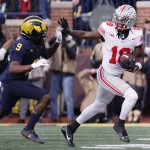 FootballR - NFL - Marvin Harrison Jr., Footballspieler der Ohio State, läuft mit dem Ball.