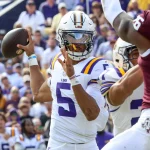 FootballR - NFL - All-America-Team - Lsu-Footballspieler Jayden Daniels wirft den Ball während eines Spiels.