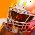 FootballR - NFL - NFL Free Agents 2024 - Ein Footballspieler mit Helm auf orangefarbenem Hintergrund.