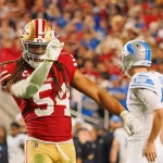 FootballR - NFL - Diese Beschreibung wurde automatisch generiert. Fred Warner, Linebacker der San Francisco 49ers, feiert.