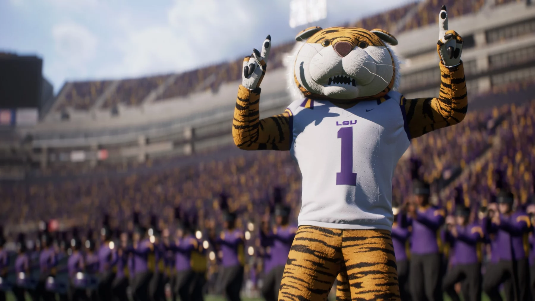 FootballR - NFL College Football 26 - Ein Tiger-Maskottchen, das triumphierend auf das College-Footballfeld zurückkehrt, trägt ein weißes Trikot mit der Nummer 1 und „LSU“ und steht mit beiden Zeigefingern nach oben auf einem Footballfeld. Im Hintergrund ist ein überfülltes Stadion mit Fans in Lila und Gold sowie einer Blaskapelle in passender lila Kleidung zu sehen. Diese Beschreibung wurde automatisch generiert.