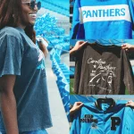 Eine lächelnde Frau mit Sonnenbrille hält einen Pompon in der Hand und trägt ein schwarzes Shirt mit pink-blauem Design. Neben ihr zeigen drei Nahaufnahmen die NFL-Kollektion: ein blaues „Panthers“-Shirt, ein grauer „Carolina Panthers Est. 1995“-Hoodie und eine Jacke mit „Keep Pounding“-Emblem von Girl Tribe Co. Diese Beschreibung wurde mit der FootballR KI automatisch generiert.