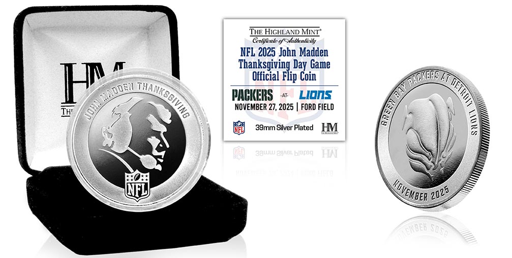Eine silberne NFL-Gedenkmünze in einer schwarzen Display-Box wird neben ihrem Echtheitszertifikat gezeigt. Sie zeigt das Logo der Packers und der Lions, das Datum 27. November 2025 und ehrt den legendären John Madden, der den Thanksgiving Day feiert. Diese Beschreibung wurde mit der FootballR KI automatisch generiert.