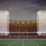 Eine Gamecard Grafik fuer das Spiel zwischen den AFC Vienna Vikings und Danube Dragons am 28.06.26. die zwei Teamlogos stehen sich in einem Stadion mit vielen Zuschauern gegenueber.