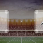 Eine Gamecard Grafik fuer das Spiel zwischen den Pforzheim Wilddogs und Berlin Rebels am 16.05.26. die zwei Teamlogos stehen sich in einem Stadion mit vielen Zuschauern gegenueber.