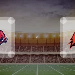 Eine Gamecard Grafik fuer das Spiel zwischen den ifm Razorbacks Ravensburg und Potsdam Royals am 06.06.26. die zwei Teamlogos stehen sich in einem Stadion mit vielen Zuschauern gegenueber.