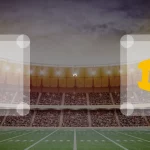 Eine Gamecard Grafik fuer das Spiel zwischen den Schwäbisch Hall Unicorns und Munich Cowboys am 13.06.26. die zwei Teamlogos stehen sich in einem Stadion mit vielen Zuschauern gegenueber.