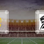 Eine Gamecard Grafik fuer das Spiel zwischen den Hildesheim Invaders und Braunschweig Lions am 08.08.26. die zwei Teamlogos stehen sich in einem Stadion mit vielen Zuschauern gegenueber.