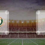 Eine Gamecard Grafik fuer das Spiel zwischen den Kiel Baltic Hurricanes und Pforzheim Wilddogs am 15.08.26. die zwei Teamlogos stehen sich in einem Stadion mit vielen Zuschauern gegenueber.