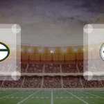 Eine Gamecard Grafik fuer das Spiel zwischen den Green Bay Packers und Pittsburgh Steelers am 14.08.26. die zwei Teamlogos stehen sich in einem Stadion mit vielen Zuschauern gegenueber.