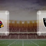 Eine Gamecard Grafik fuer das Spiel zwischen den Arizona Cardinals und Las Vegas Raiders am 14.08.26. die zwei Teamlogos stehen sich in einem Stadion mit vielen Zuschauern gegenueber.