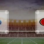 Eine Gamecard Grafik fuer das Spiel zwischen den Tennessee Titans und San Francisco 49ers am 14.08.26. die zwei Teamlogos stehen sich in einem Stadion mit vielen Zuschauern gegenueber.