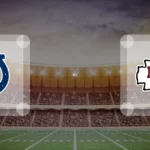Eine Gamecard Grafik fuer das Spiel zwischen den Indianapolis Colts und Kansas City Chiefs am 21.09.26. die zwei Teamlogos stehen sich in einem Stadion mit vielen Zuschauern gegenueber.