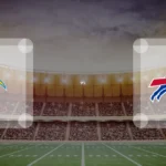 Eine Gamecard Grafik fuer das Spiel zwischen den Los Angeles Chargers und Buffalo Bills am 27.09.26. die zwei Teamlogos stehen sich in einem Stadion mit vielen Zuschauern gegenueber.