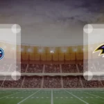 Eine Gamecard Grafik fuer das Spiel zwischen den Tennessee Titans und Baltimore Ravens am 04.10.26. die zwei Teamlogos stehen sich in einem Stadion mit vielen Zuschauern gegenueber.