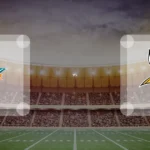 Eine Gamecard Grafik fuer das Spiel zwischen den Miami Dolphins und Minnesota Vikings am 05.10.26. die zwei Teamlogos stehen sich in einem Stadion mit vielen Zuschauern gegenueber.
