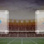 Eine Gamecard Grafik fuer das Spiel zwischen den Detroit Lions und Miami Dolphins am 08.11.26. die zwei Teamlogos stehen sich in einem Stadion mit vielen Zuschauern gegenueber.