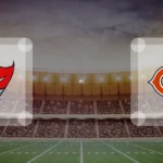 Eine Gamecard Grafik fuer das Spiel zwischen den Tampa Bay Buccaneers und Chicago Bears am 09.11.26. die zwei Teamlogos stehen sich in einem Stadion mit vielen Zuschauern gegenueber.