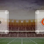 Eine Gamecard Grafik fuer das Spiel zwischen den New Orleans Saints und Chicago Bears am 22.11.26. die zwei Teamlogos stehen sich in einem Stadion mit vielen Zuschauern gegenueber.