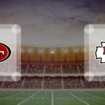 Eine Gamecard Grafik fuer das Spiel zwischen den San Francisco 49ers und Kansas City Chiefs am 27.12.26. die zwei Teamlogos stehen sich in einem Stadion mit vielen Zuschauern gegenueber.